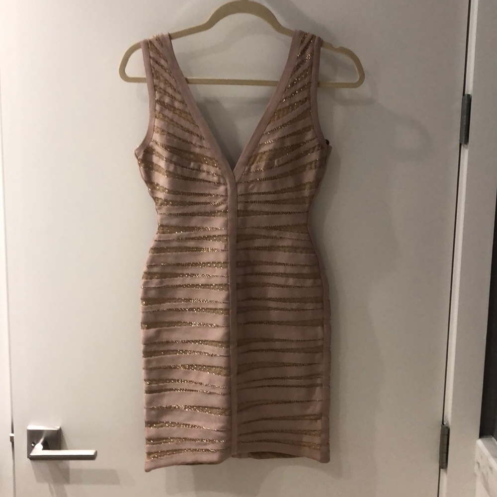 Nude pink Herve Leger dress.